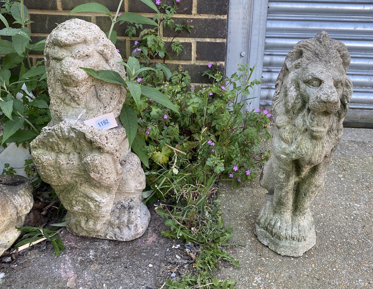 A reconstituted stone heraldic lion, height 58cm, and one other lion garden ornament